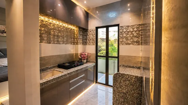 Modular kitchen with balcony door in the sample flat